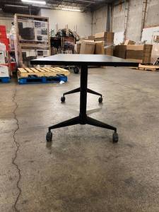 lot 78 image: Black Office Table on Roller Wheels