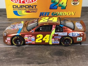 lot 101 image: 1998 Nascar Revell Collection Jeff Gordon Chevy Monte Carlo #24  DuPont Chromalusion 118 scale die cast stock car
