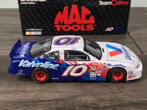lot 111 image: 2001 Nascar Mac Tools Team Caliber Johnny Benson Pontiac Grand Prix #10  Valvoline 124 scale die cast stock car