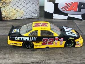 lot 131 image: 1999 Nascar Action Ward Burton Pontiac #22  Caterpillar 124 scale die cast stock car