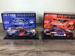 lot 158 image: 2000 Nascar Racing Champions Under the Lights 2 Car Set Ford Taurus 2K & Chevy Monte Carlo Y2K 124 scale die cast stock cars