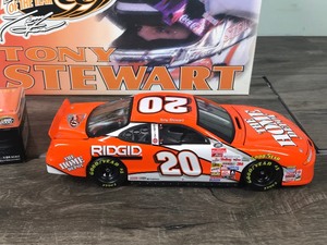 lot 160 image: 2000 Nascar Revell Collection 2 Car Set Tony Stewart Pontiac Grand Prix #20  Home Depot - Rookie of the Year 164 scale & 124 scale stock cars