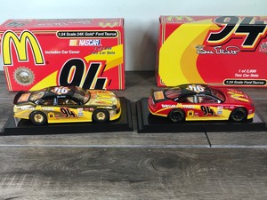 lot 167 image: 1999 Nascar Racing Champions 2 Car set 24k gold car and Regular paint car Bill Elliott McDonalds Ford Taurus 124 scale die cast stock cars