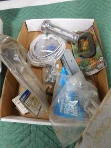 lot 34 image: Linseed oil, Valvoline gear oil, gear lube, tester, boat light brackets, universal flusher and more