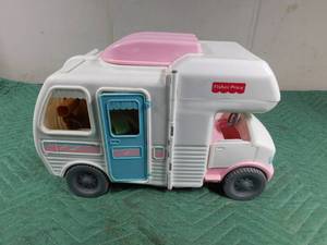 lot 55 image: Fisher Price motor home with all the accessories and people