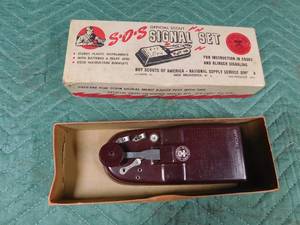 lot 63 image: Vintage Bot Scout of America S.O.S. signal set in original box