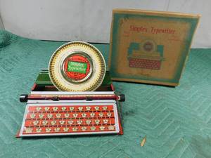 lot 64 image: Vintage Childs Simplex metal typewriter