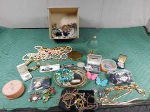 lot 95 image: box full of vintage jewelry, vintage powder compact and more
