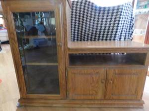 lot 1 image: Solid wood cabinet with glass door