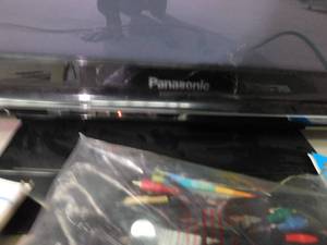 lot 4 image: 42 Panasonic TV with ROKU and remotes