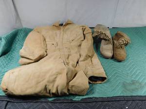 lot 280 image: Insulated overalls and canvasleather boots