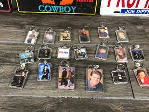 lot 348 image: Country Music License Plates and Key Chain Collectibles
