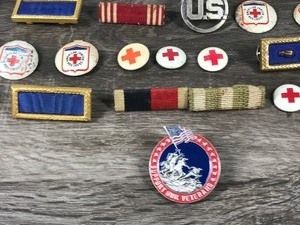 lot 362 image: Lot of Military Ribbons, Red Cross Pins and More