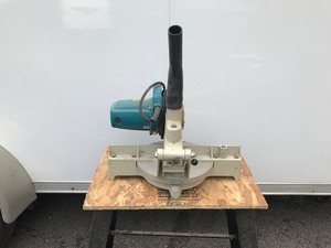lot 404 image: Makita 10 Miter Saw on Stand