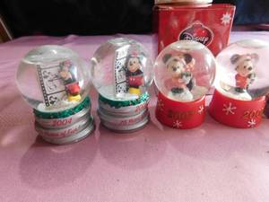 lot 378 image: Minnie Mouse glass ornament and 7 JC Pennys Promotion gift Mickey Mouse snow Globes