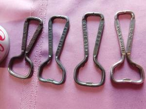 lot 379 image: Schells Farmfest 76 beer can and 4 vintage advertised bottle openers