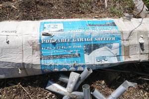 lot 42 image: Portable Garage Shelter