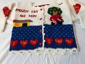 lot 61 image: Vintage Reggedy Ann & Andy Childs Sweater & 90th Birthday Book Gift set