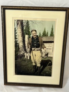lot 105 image: Vintage Hand Tinted Photo of Hunting Man Holding a Bird