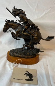 lot 172 image: FREDERIC REMINGTON Sculpture on Wood Stand by Cheyenne