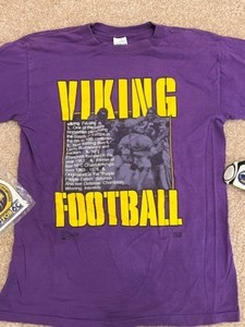 lot 39 image: Vintage VIKINGS Football T-shirt, Miniature Duffle 1969 20th Anniversary NFL Champs
