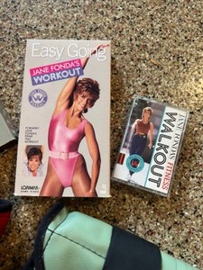lot 84 image: Vintage 80s retro Jane Fonda Exercise Tapes and Ankle Weights