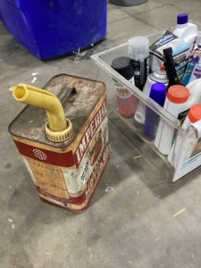 Vintage Imperial Motor Oil can with assorted garage items
