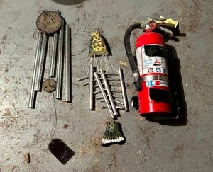 lot 297 image: Wind Chimes & Fire Extinguisher