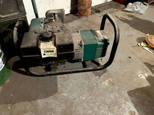 lot 243 image: Coleman Powermate Generator