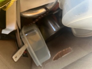 box full of kitchen utencils