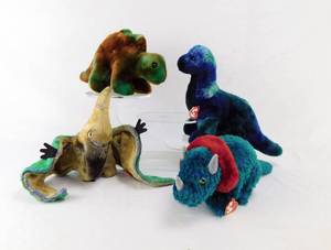 lot 17 image: Lot of 4 Dinosaur Beanie Buddies Including  Steg,Bronty,