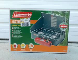 lot 135 image: Coleman Two Fuel Burning Stove
