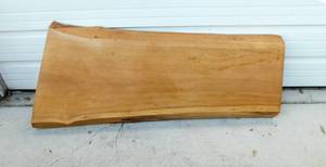 lot 28 image: Slab of Finished Wood