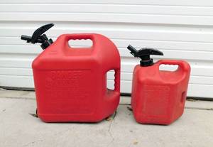 lot 143 image: 3 Gas Cans and 1 7 Gallon Water Jug