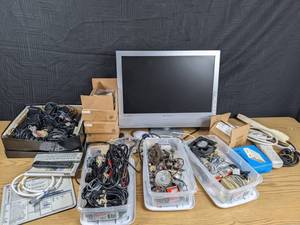 lot 32 image: Various Cords, Remotes, 22 Inch Element Monitor and More