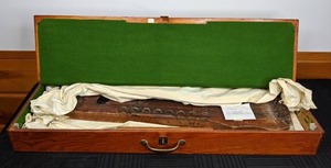 lot 6 image: Antique 1920s Ukelin by The Basstone Co. with Wood Case