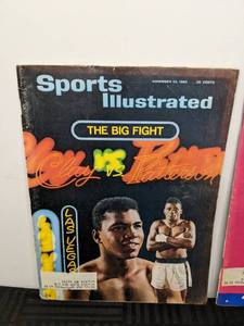 lot 26A image: Vintage Cassius Clay 1965 &1967 Sports Illustrated Magazines with Muhammad Ali 1981 Book