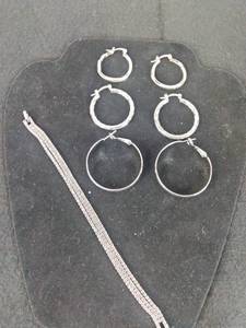 lot 385 image: 3 Pairs of Stainless Steel Hoop Earrings and 7 Bracelet