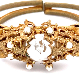 lot 26 image: Miriam Haskell Vintage Yellow Base Metal Hinged Cuff Bracelet. Imitation Pearls.