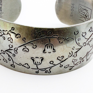 lot 32 image: Kirk Stieff Lily Of The Valley Pewter Cuff Bracelet.