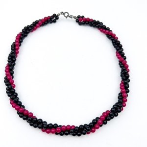 lot 70 image: Eyecatching black and raspberry pink , Unknown Maker, Base Metal Multi-Strand Bead Necklace.