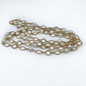 lot 73 image: Rope length, Unknown Maker, Synthetic Bead Yellow Base Metal Bead Necklace.