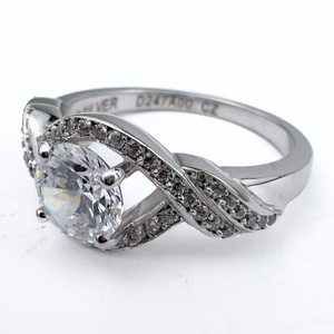 lot 80 image: Retired Bridal Sample Sterling Silver Engagement Style Ring. Size 7.
