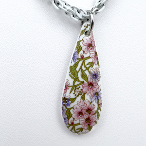 lot 106 image: Transfer Print Floral Pattern, White Enamel Coated Base Metal Opera Necklace.