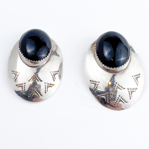 lot 13 image: J Roybal (Navajo) Sterling Silver Post Back Pierced Earrings. Onyx And Stamped Pattern.