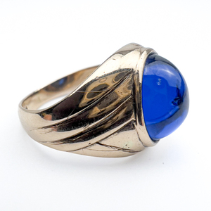 lot 5 image: Man Made Sapphire, Yellow 10K Ring, Set With Man Made Sapphire. Size 8 - 8.25.
