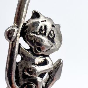 lot 96 image: Cat on a Hook, Jonette  Pewter Solid Cast Charm.