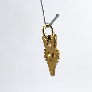 lot 122 image: Fox Head, Unknown Maker, Gold Plated Sterling Silver One-Part Stamped Charm.