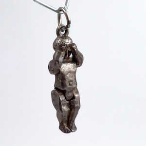 lot 130 image: Doll charm, Unknown Maker, VINTAGE Sterling Silver Solid Cast Charm. Mechanical - Articulated