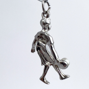 lot 141 image: Bowling Lady, Unknown Maker, VINTAGE Sterling Silver Solid Cast Charm.